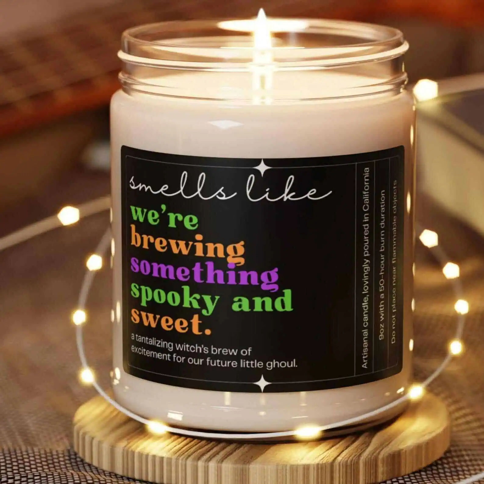 Warm scent candle with spooky and sweet themed label, ideal for cozy and festive atmospheres.