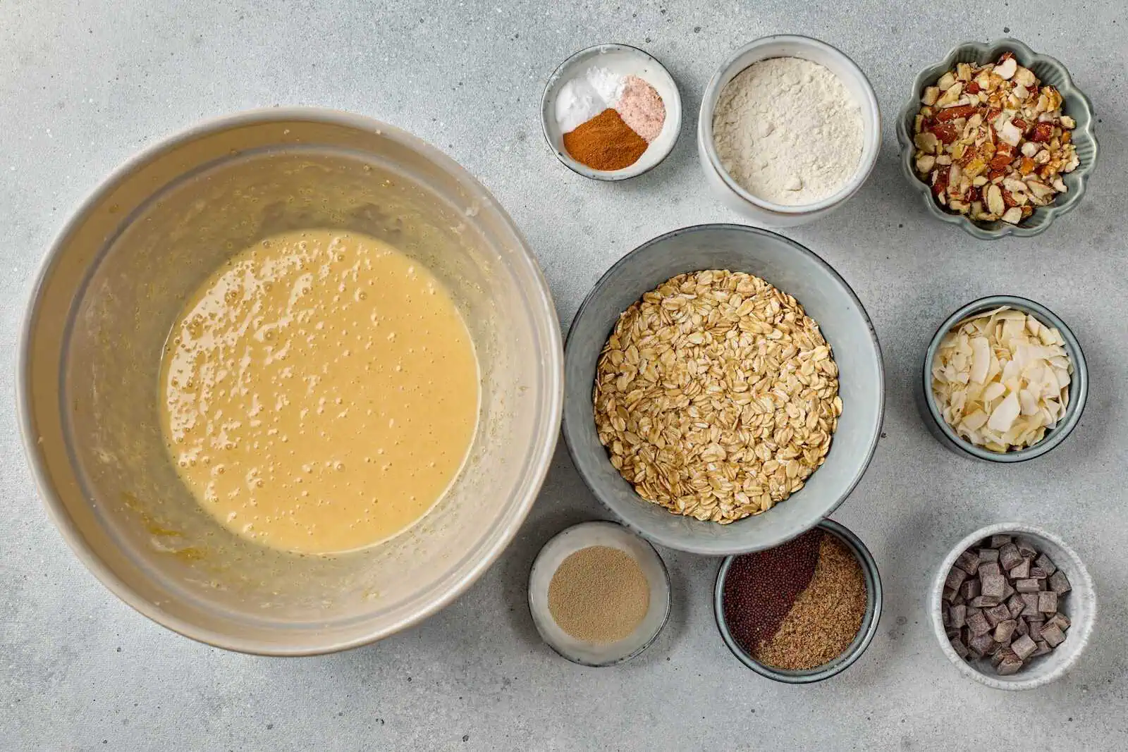 Delicious oatmeal cookies ingredients including oats, chocolate, nuts, and spices. Perfect for baking healthy cookies.